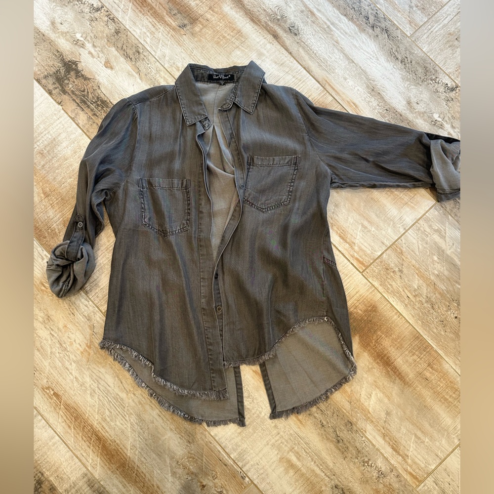 NEVER WORN Button down blouse with frayed edge and split back.